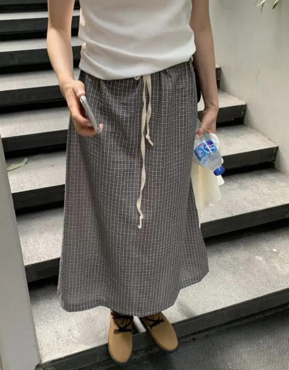 미뉴에트 nofe check skirt